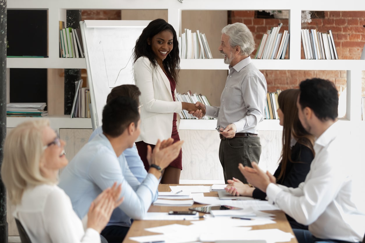 Team members at a leadership development meeting
